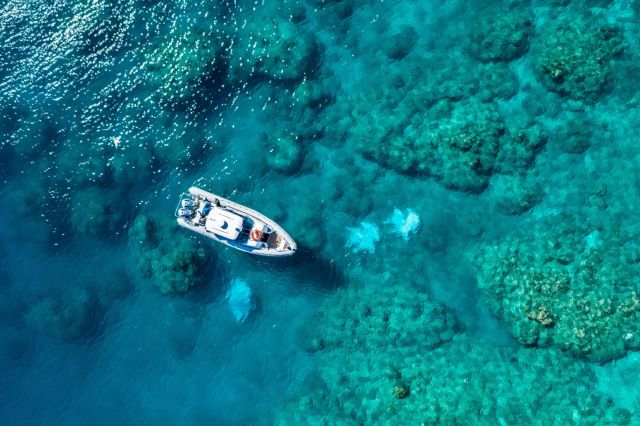 Boat in shallow waters of the reef
